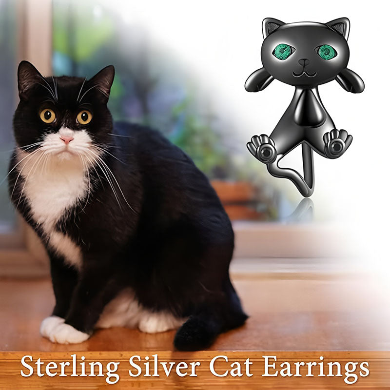 Origsoul sterling silver cat face earrings with green eyes inspired by a black and white cat