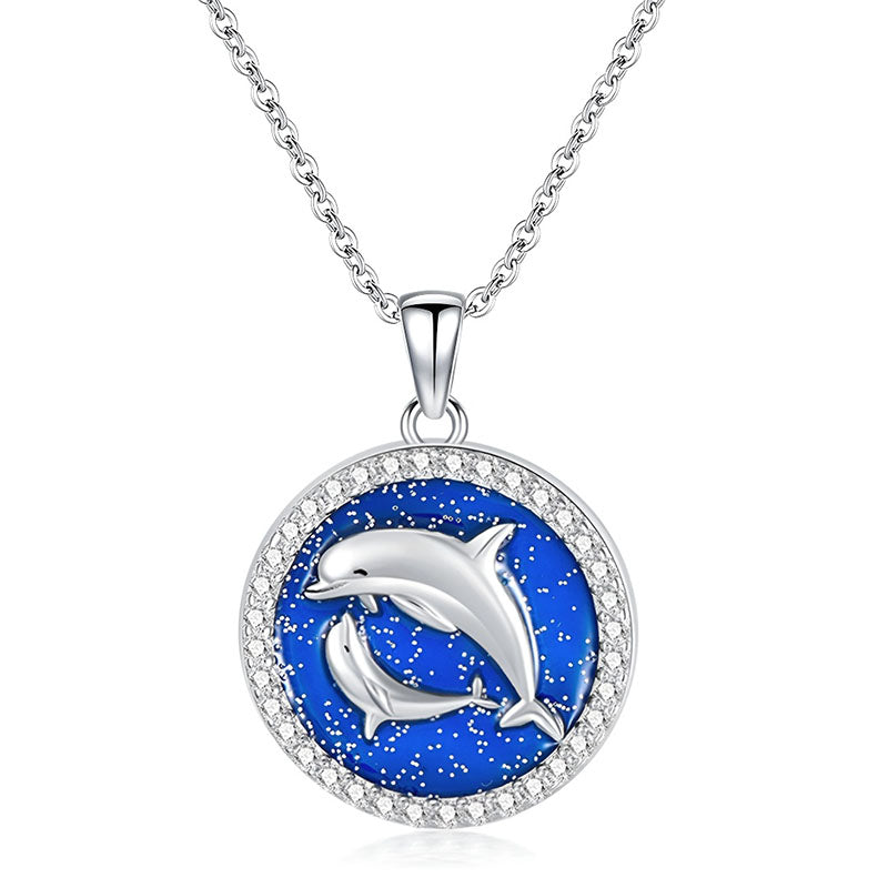 Origsoul sterling silver dolphin pendant necklace with blue background and sparkling details