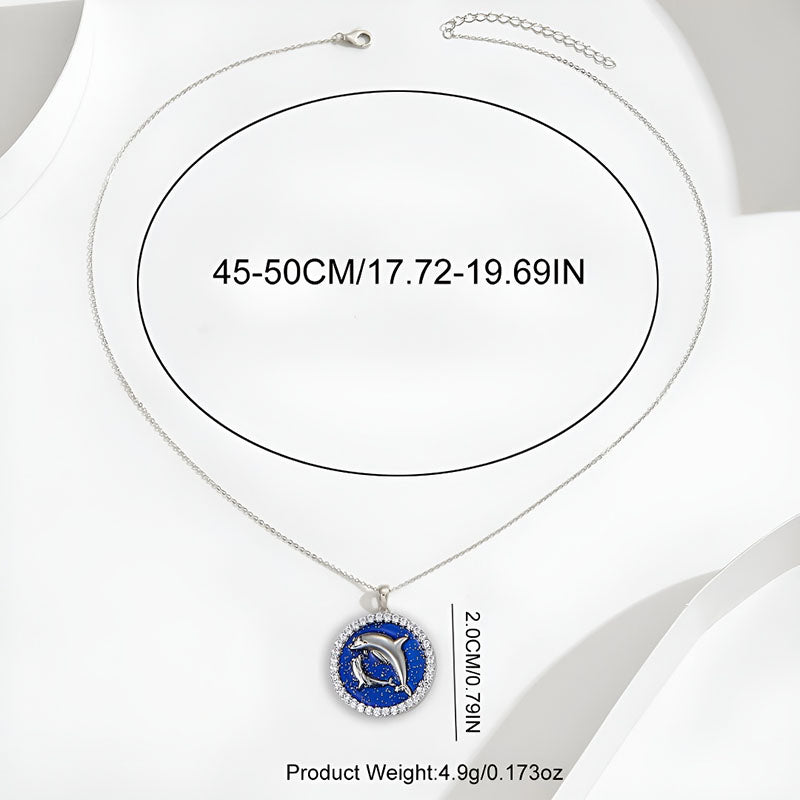 Sterling silver dolphin pendant necklace with blue enamel and sparkling accents, 17.72 to 19.69 inches in length