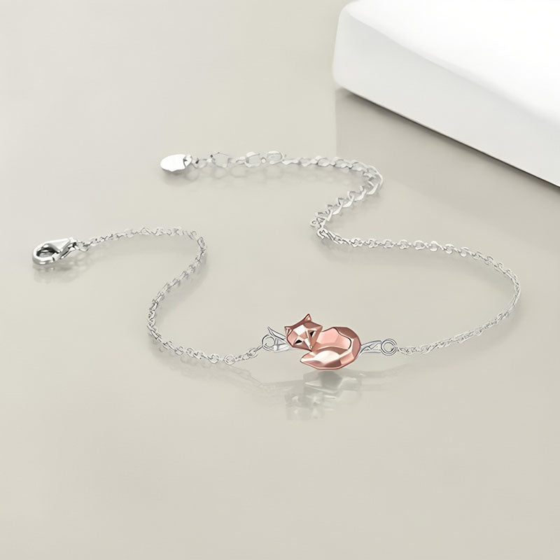Origsoul sterling silver fox bracelet with a rose gold fox charm on a delicate chain