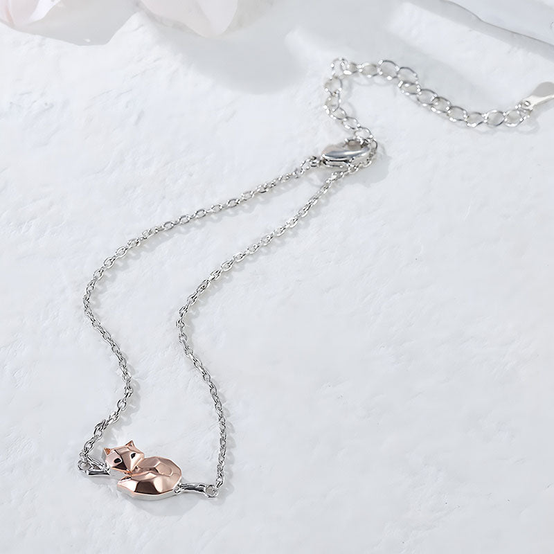 Origsoul sterling silver fox bracelet with a rose gold fox charm on delicate chain