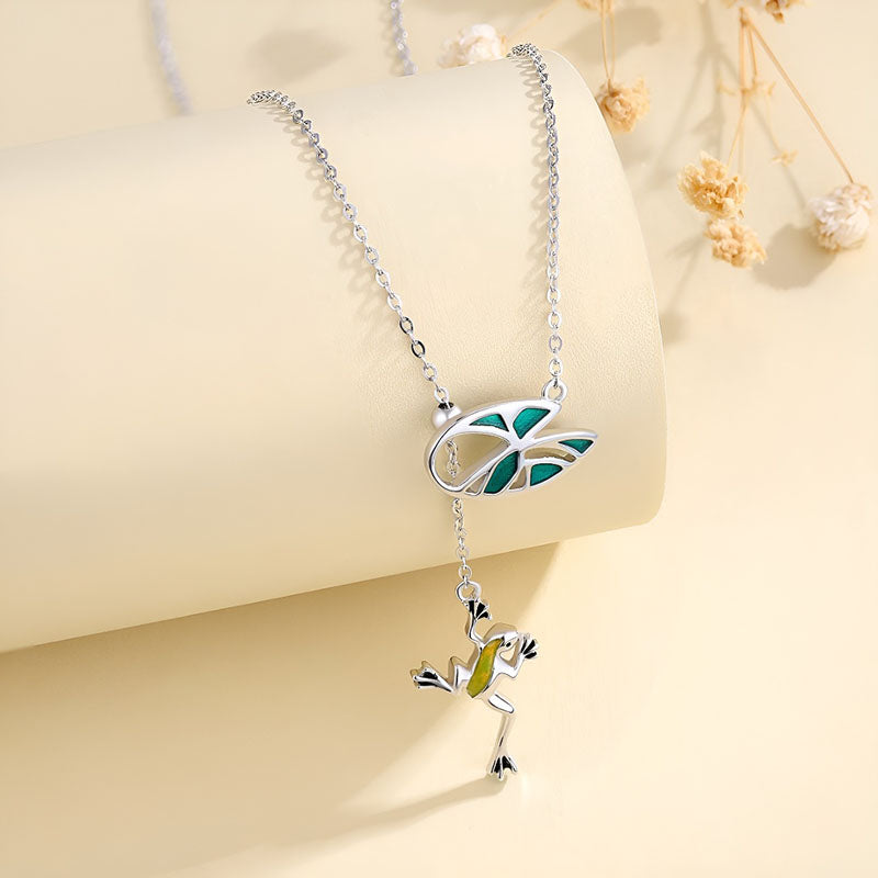 Origsoul sterling silver frog pendant necklace featuring a colorful frog design with a leaf detail