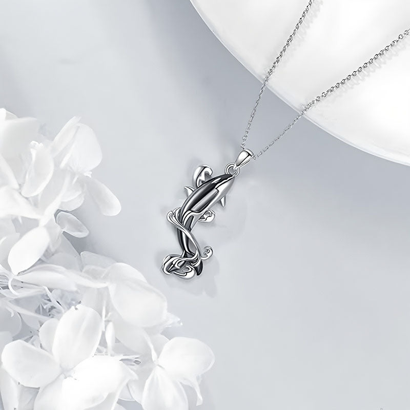 Sterling silver killer whale necklace with a unique design, perfect for ocean lovers