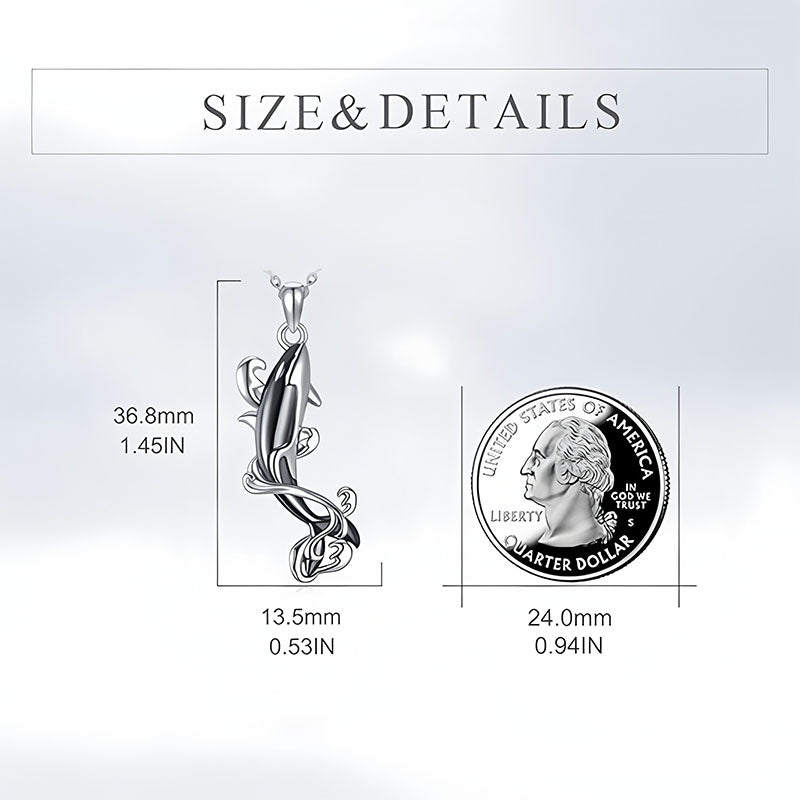 Sterling silver killer whale necklace featuring a sleek design with delicate details