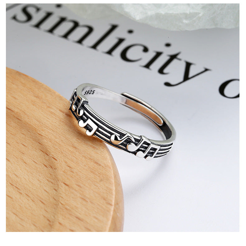 Origsoul music note eternity ring in silver with musical notes and staff design