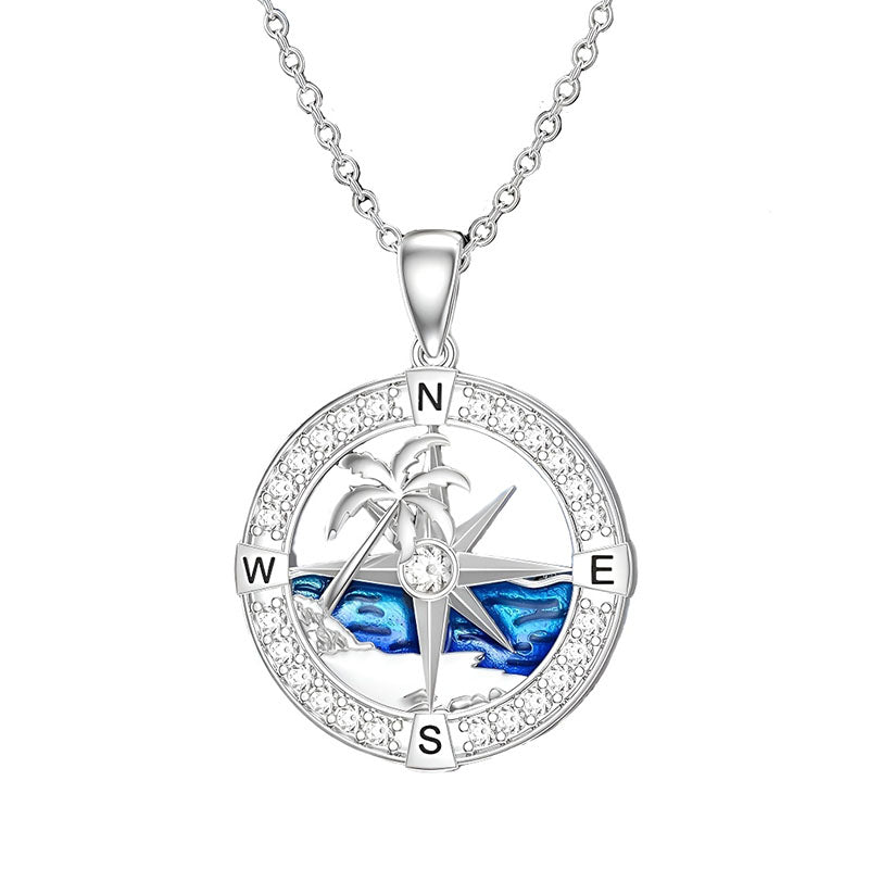 Origsoul sterling silver ocean compass necklace featuring a blue ocean and palm tree design