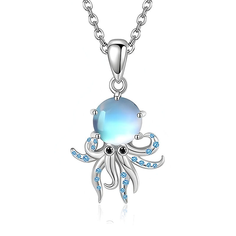 Origsoul sterling silver octopus pendant featuring an iridescent gemstone and blue accents