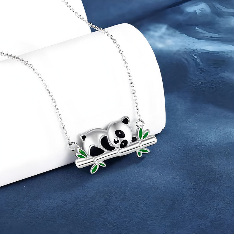 Origsoul sterling silver panda necklace with green enamel leaves on a delicate silver chain