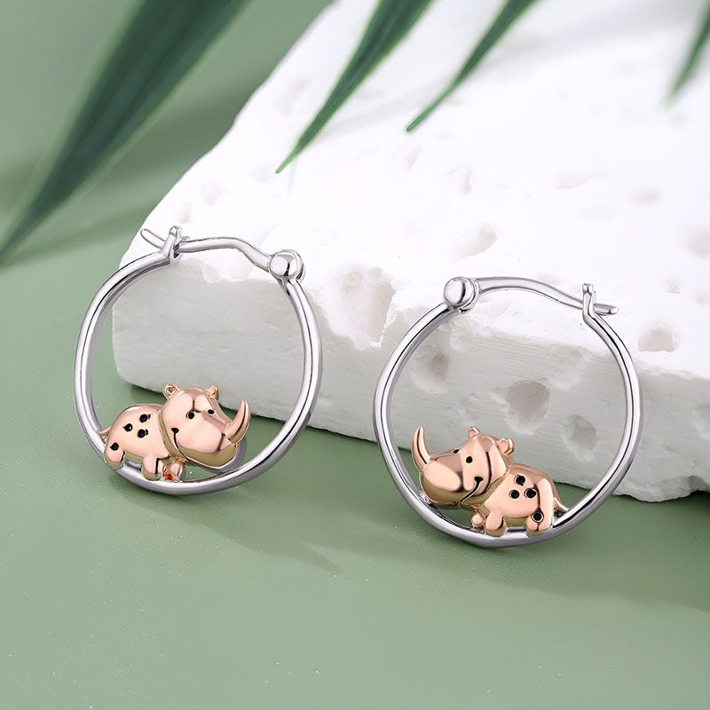 Origsoul sterling silver rhino earrings featuring playful rhino designs in a hoop style