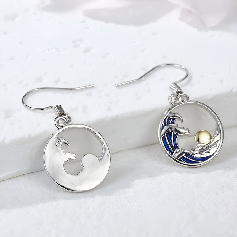 Origsoul sterling silver sunset wave earrings featuring a wave design with gold accent