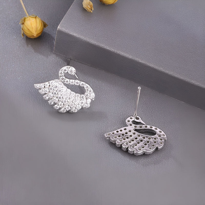 Origsoul sterling silver swan earrings with sparkling details for elegant style