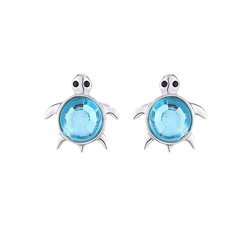 Origsoul sterling silver turtle earrings with blue gemstone accents for an elegant look
