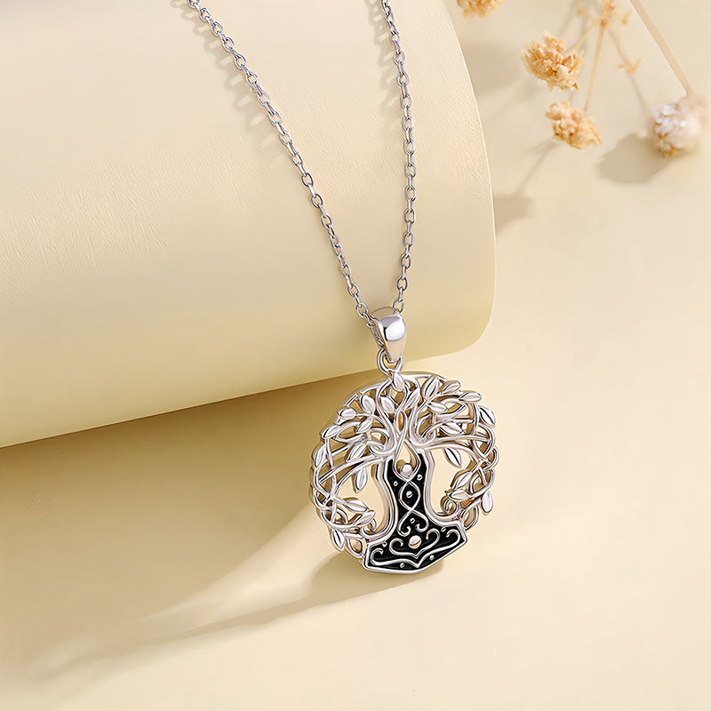 Origsoul silver tree of life necklace with intricate leaf design and black enamel accents