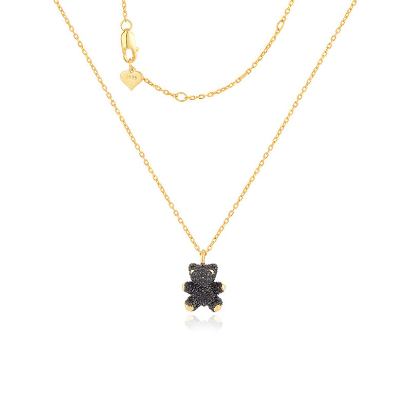 Origsoul unique gold bear pendant for special occasions on a layered gold chain