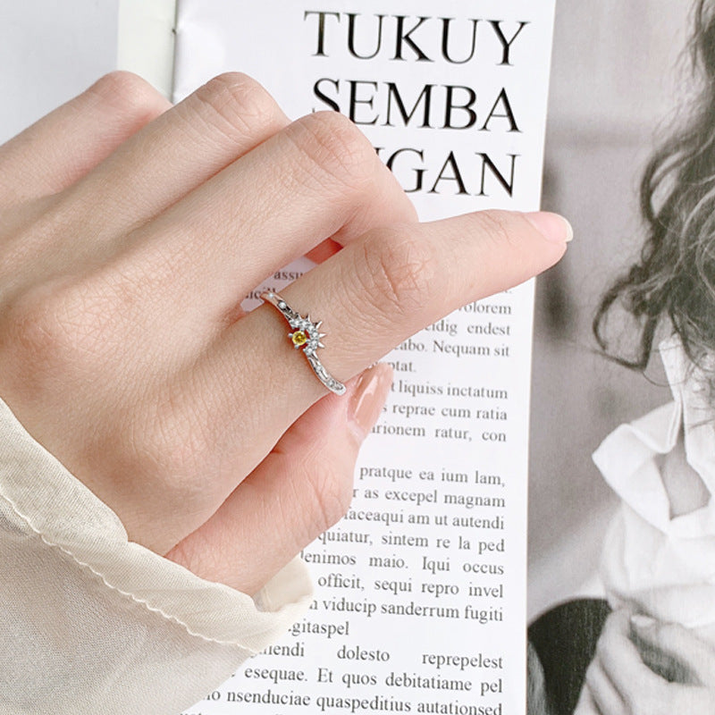 Origsoul unique promise ring for him and her with intricate design on hand over book background