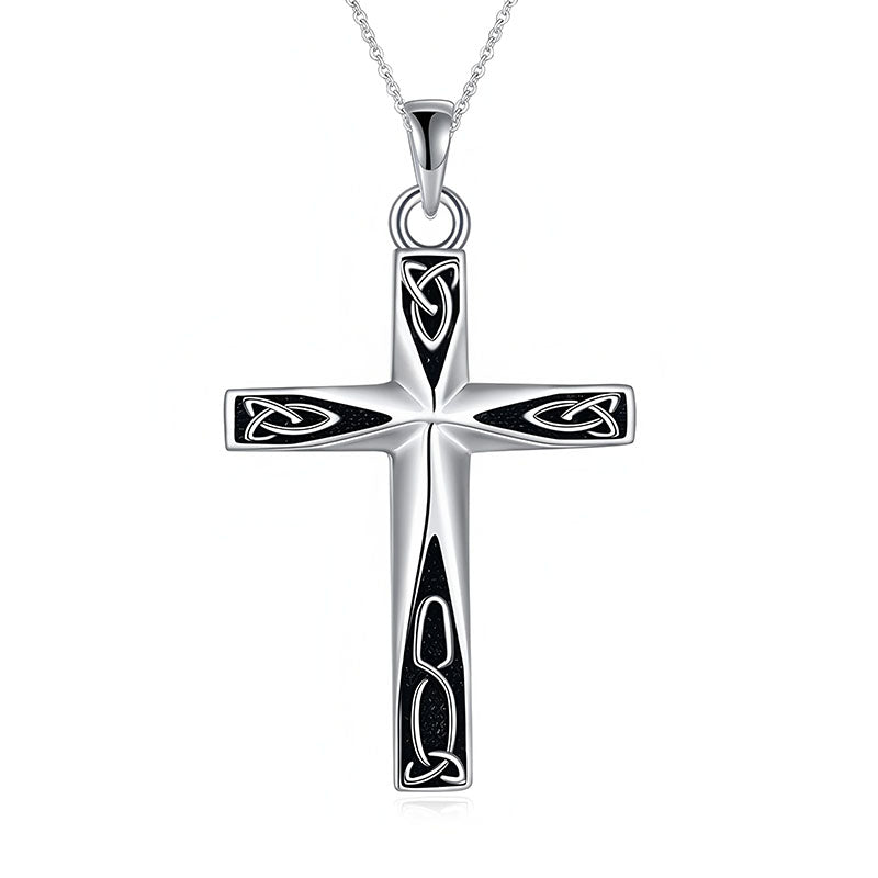 Unique silver cross necklace gift by Origsoul with intricate Celtic knot design on a silver chain