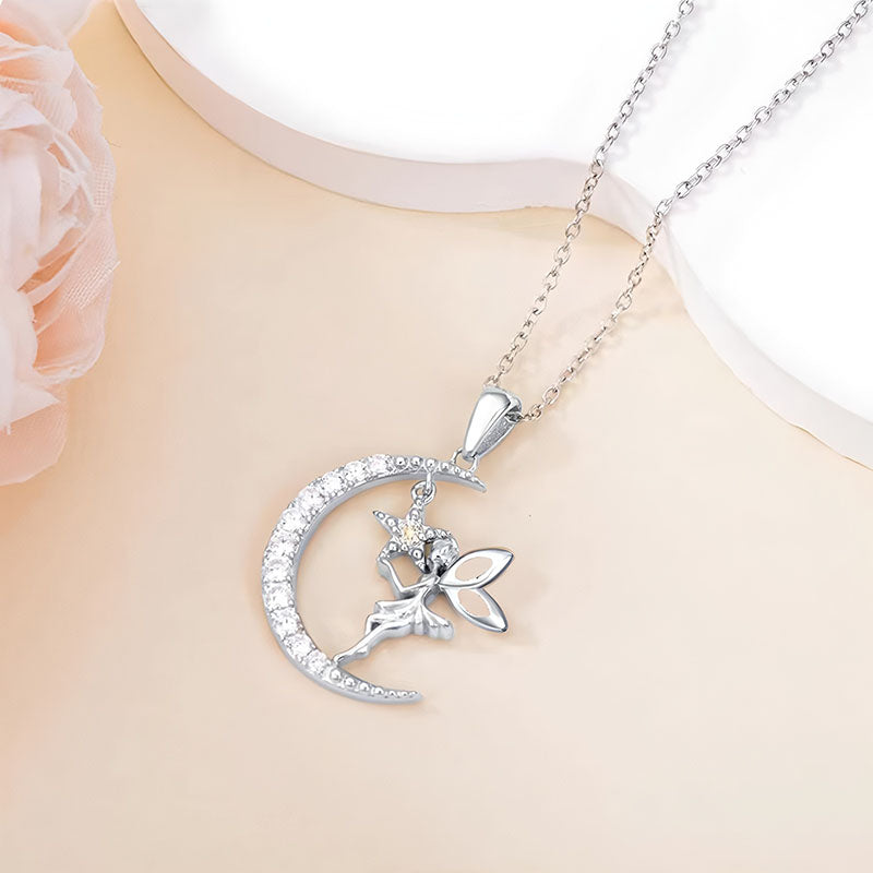 Origsoul fairy moon pendant necklace in silver with a crescent moon and fairy design on a delicate chain