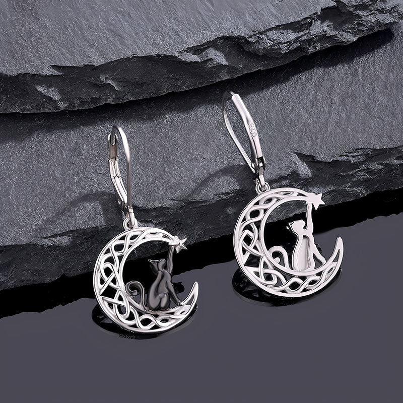 Origsoul cat and moon Celtic earrings featuring intricate silver crescent moon and cat design