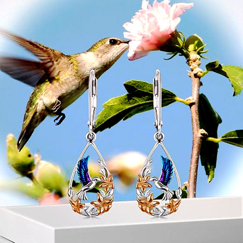 Origsoul handcrafted bird drop earrings with colorful hummingbird and floral design on silver teardrop frame