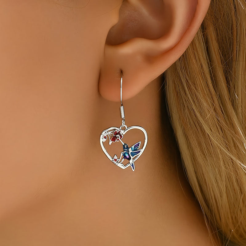 Origsoul hummingbird heart earrings with colorful enamel hummingbird and heart-shaped silver design