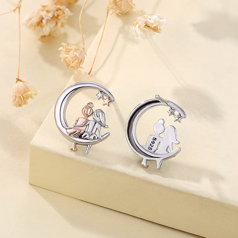 Origsoul silver moon and star fashion earrings featuring two figures sitting on crescent moons