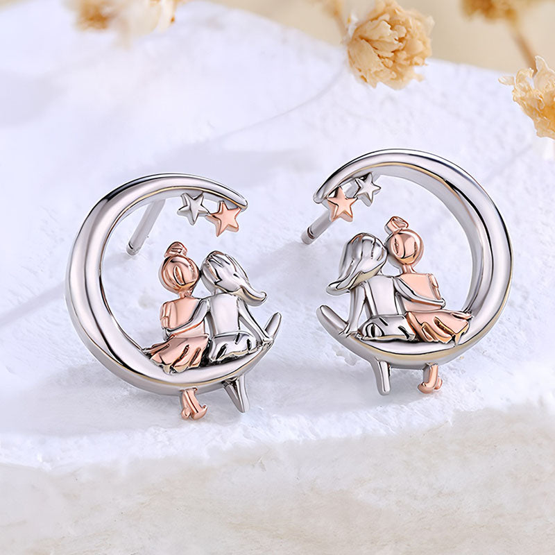 Origsoul moon and star fashion earrings featuring a couple sitting on crescent moons with star accents