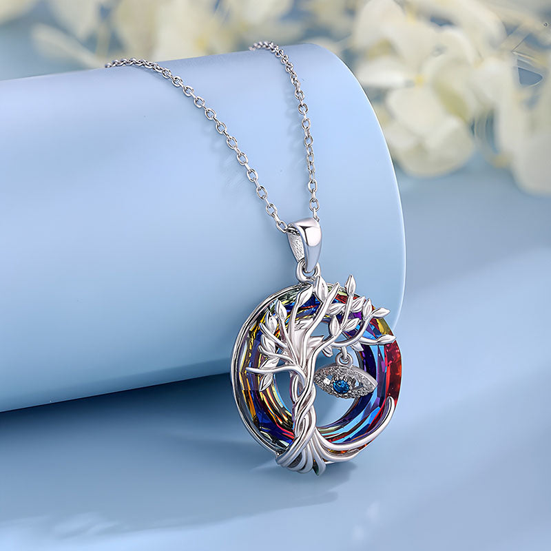 Origsoul tree of life pendant necklace with silver tree design and colorful crystal background
