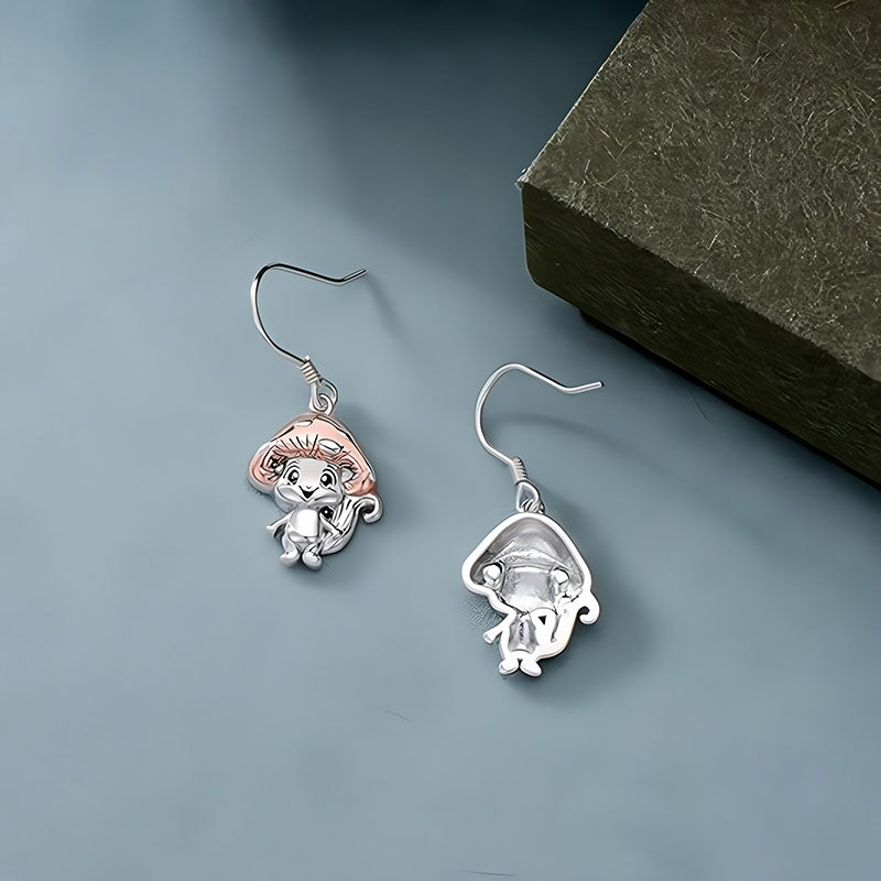 Origsoul whimsical mushroom charm earrings with playful mushroom character design in silver tone