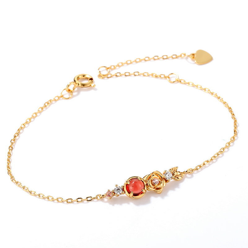Garnet Flower Bracelet in 925 sterling silver, on the wrist — Origsoul
