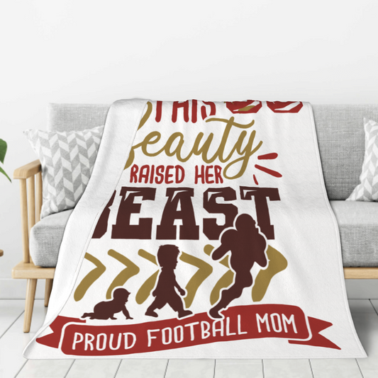 Origsoul 240g flannel blanket with proud football mom design draped over a gray sofa
