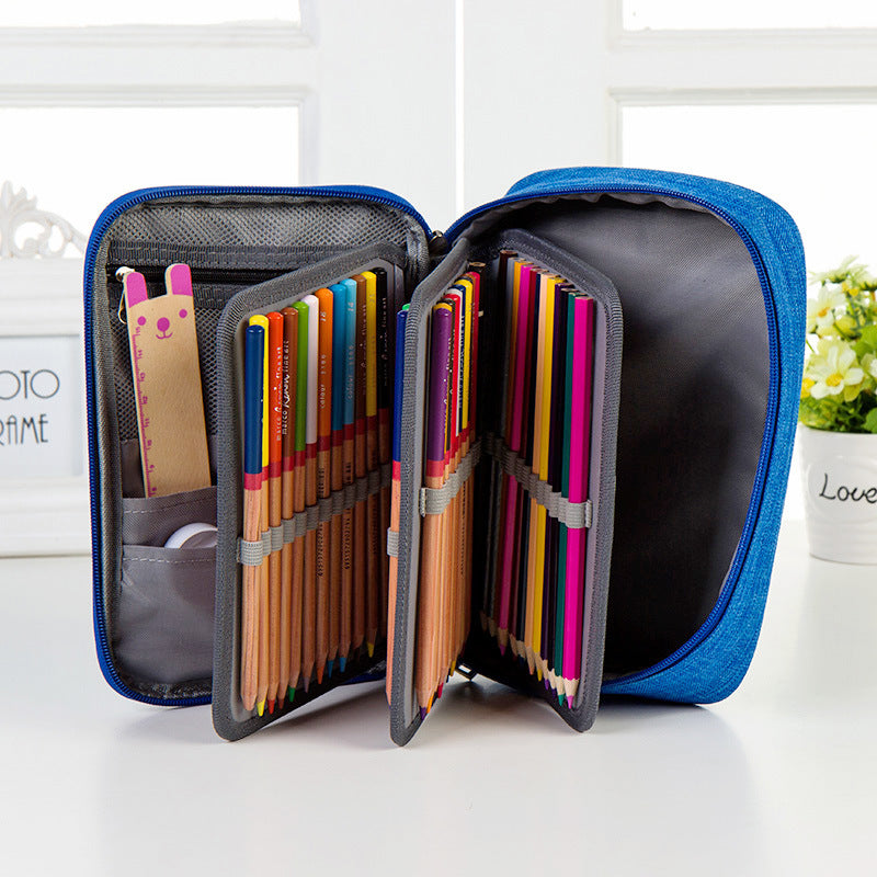 Origsoul 72 slot pencil case organizer in blue holding colored pencils and a ruler