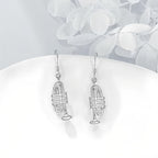 Origsoul 925 silver trumpet earrings with detailed trumpet design and hook closures