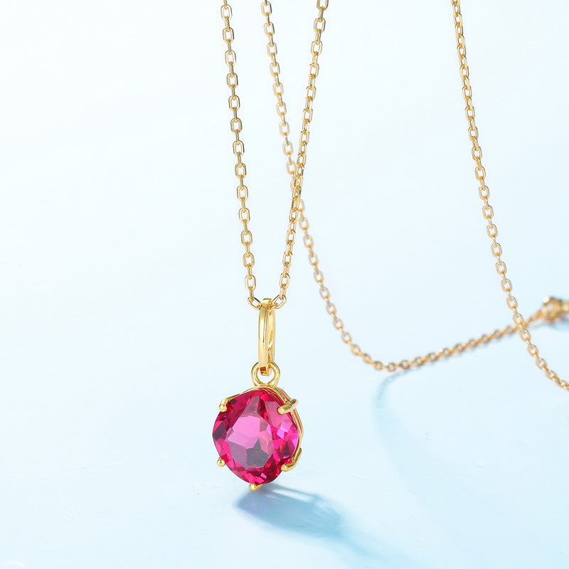 Origsoul gold necklace with a pink gemstone pendant showcasing affordable luxury jewelry