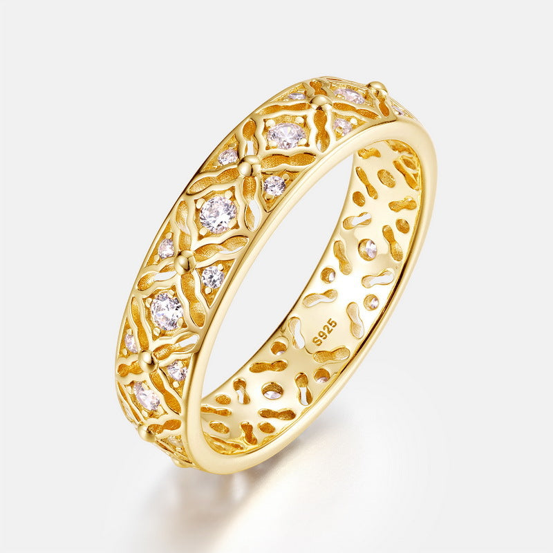 Origsoul gold ring of engagement with intricate lattice design and sparkling gemstones