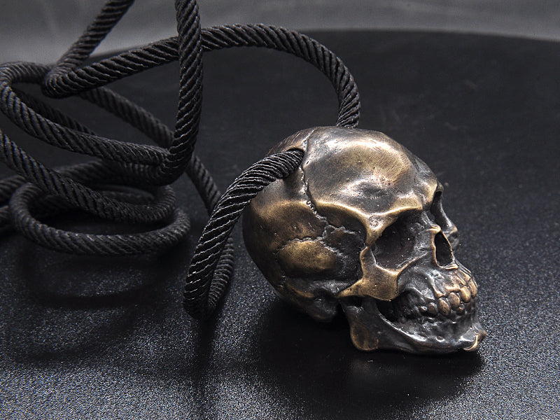 Origsoul artisan skull pendant for men in antique silver finish with black braided cord necklace