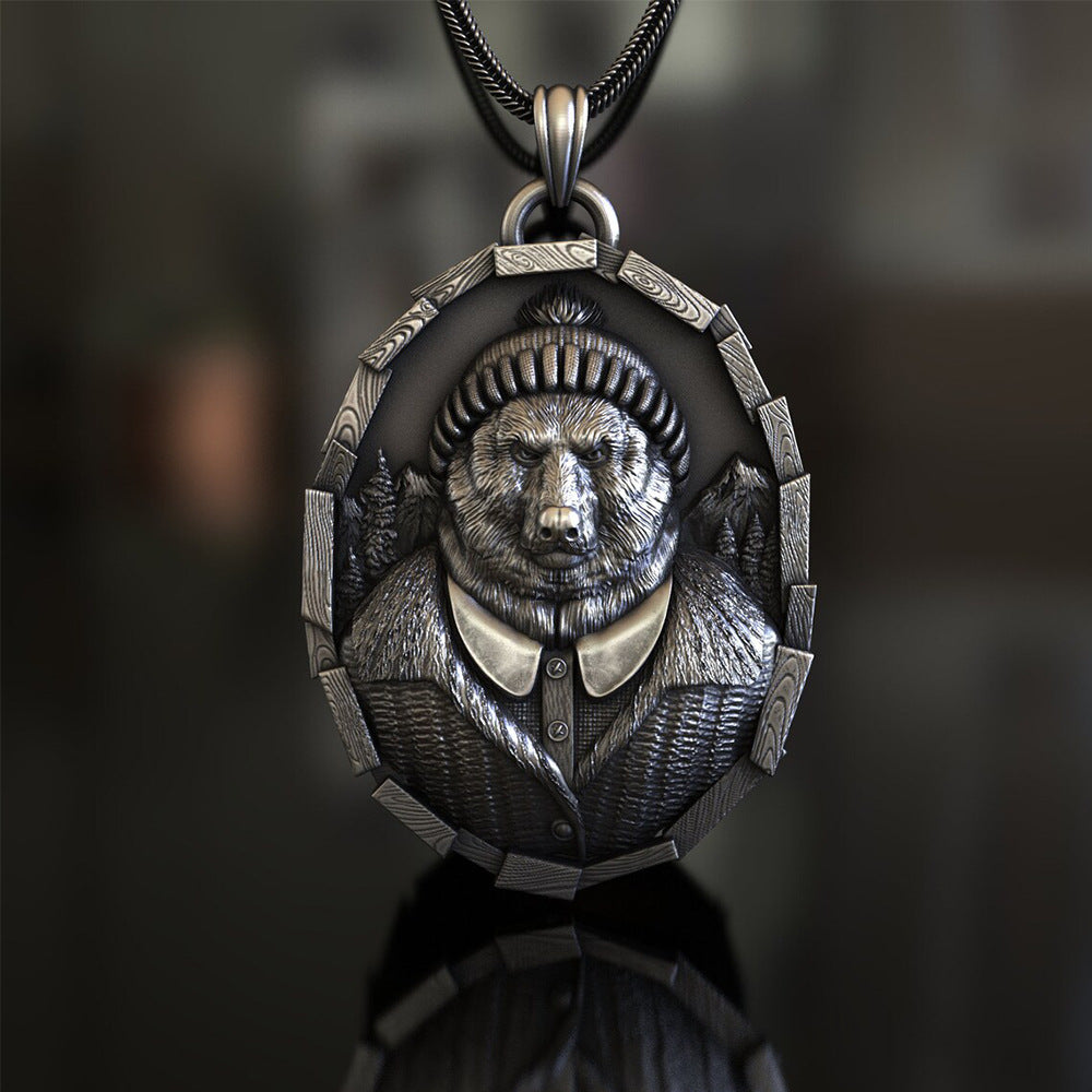 Origsoul detailed bear pendant necklace featuring a bear wearing a knit hat and jacket