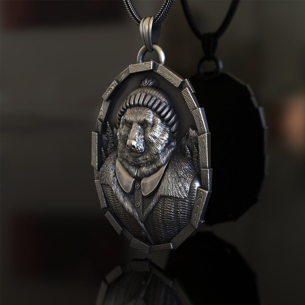 Origsoul detailed bear pendant necklace featuring a bear in winter clothing with textured metal finish