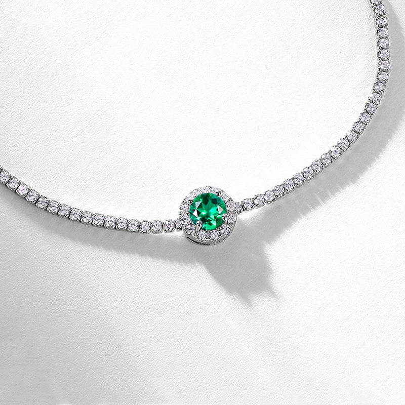 Origsoul bracelet sterling silver with a central green gemstone surrounded by clear crystals