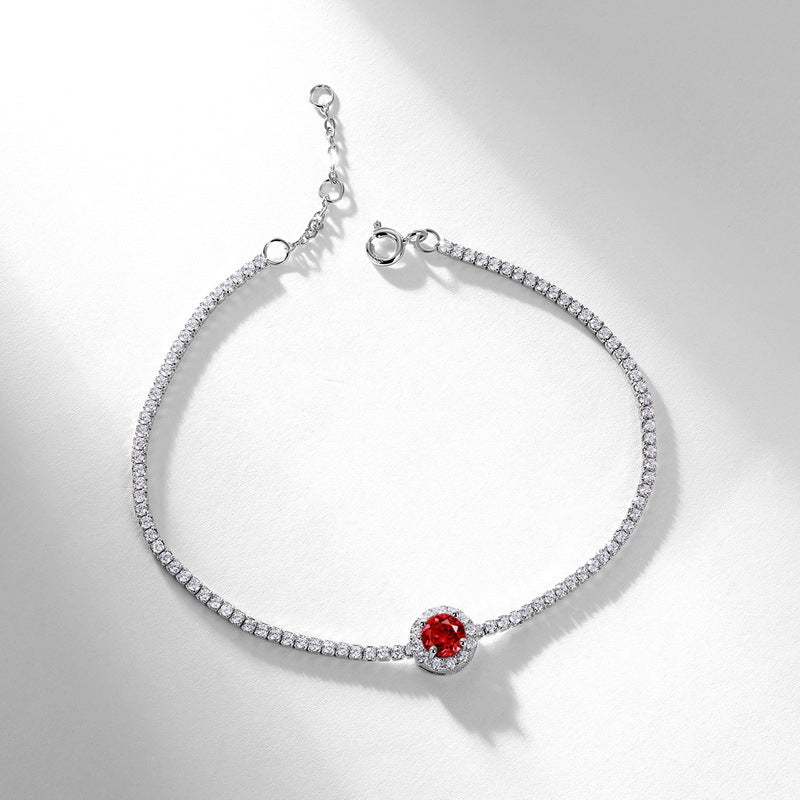 Origsoul bracelet sterling silver with a delicate chain and a central red gemstone