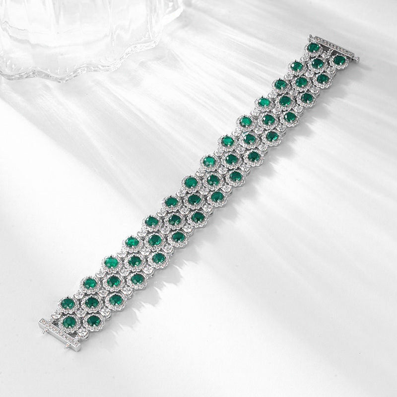Origsoul bracelet tennis diamond with green gemstones and sparkling clear stones in a silver setting
