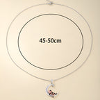 Origsoul cartoon cow moon pendant necklace with a playful design, perfect for fun and stylish looks