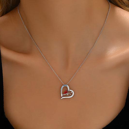 Origsoul cartoon parrot love necklace with heart-shaped pendant and silver chain on model