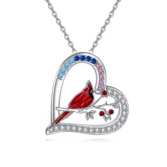 Origsoul cartoon parrot love necklace featuring a red bird on a heart-shaped silver pendant with colorful gemstones