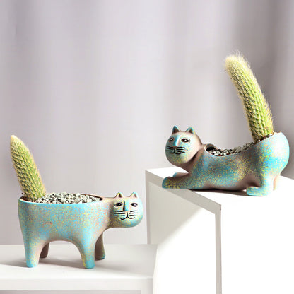 Origsoul cat shaped succulent planter with blue speckled finish holding small cacti for home decoration