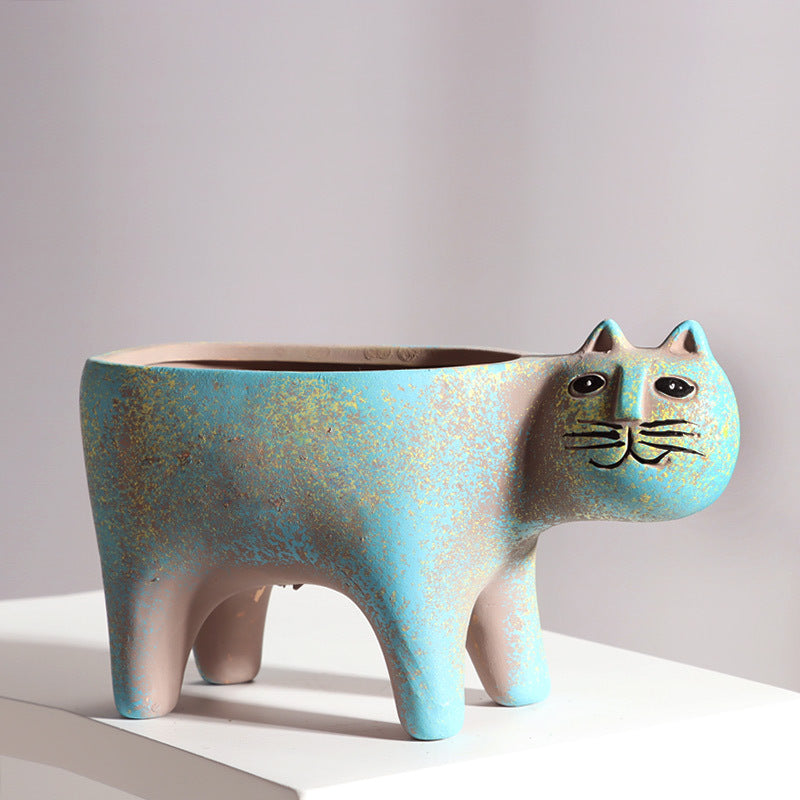 Origsoul cat shaped succulent planter in blue and beige with a whimsical cat face and four legs