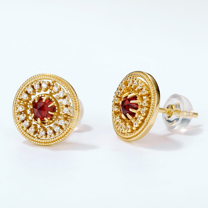 Origsoul gold chanel vintage earrings with red center stones and surrounding clear crystals