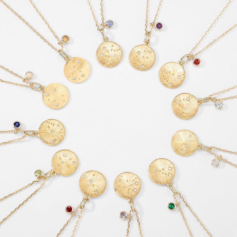 Origsoul necklace birthstone collection featuring gold round pendants with various colorful birthstone charms