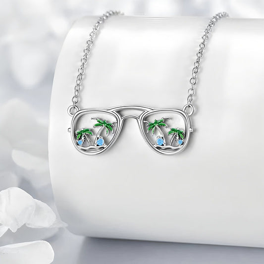 Origsoul silver beach sunglasses necklace with palm tree and blue stone detailing
