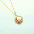Origsoul freshwater pearl necklace with gold chain and round pendant studded with crystals