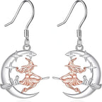 Origsoul crescent moon dangle earrings with witch and cat design in silver and rose gold tones